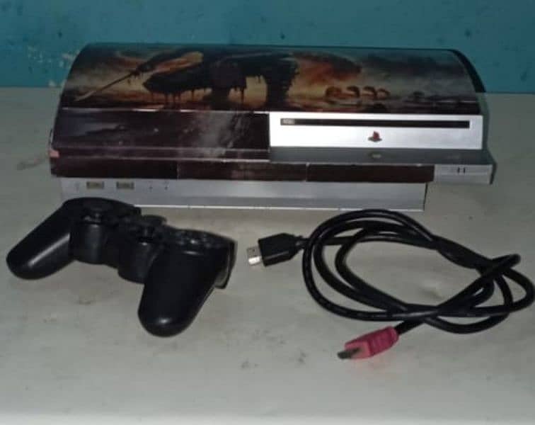 PS3 250. GB HARD DRIVE 5 GAMES INSTALLED ONE CONTROLLER AND HDMI CABLE 1