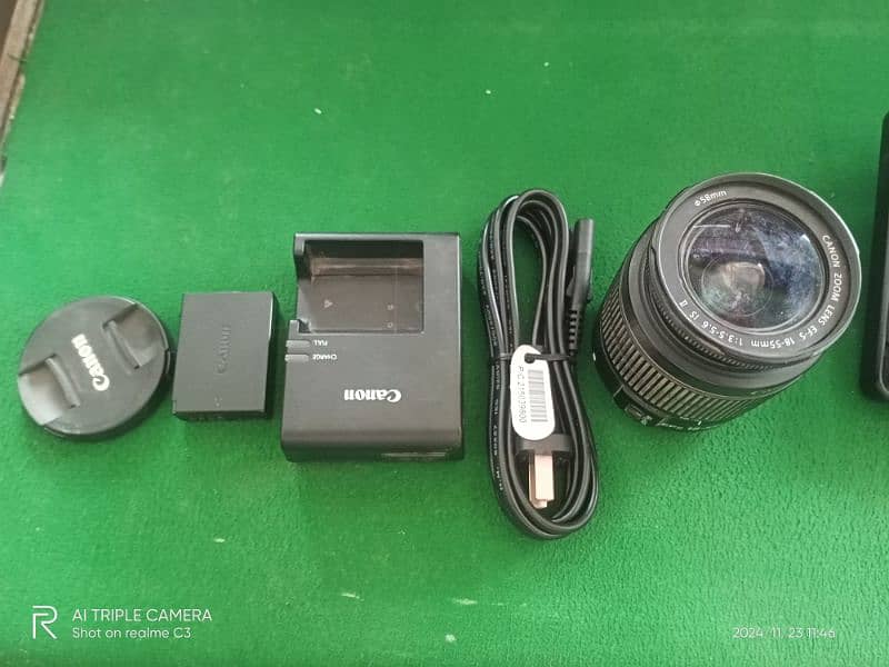 canon D1300 lens 18.55 original Battery original  charger 3