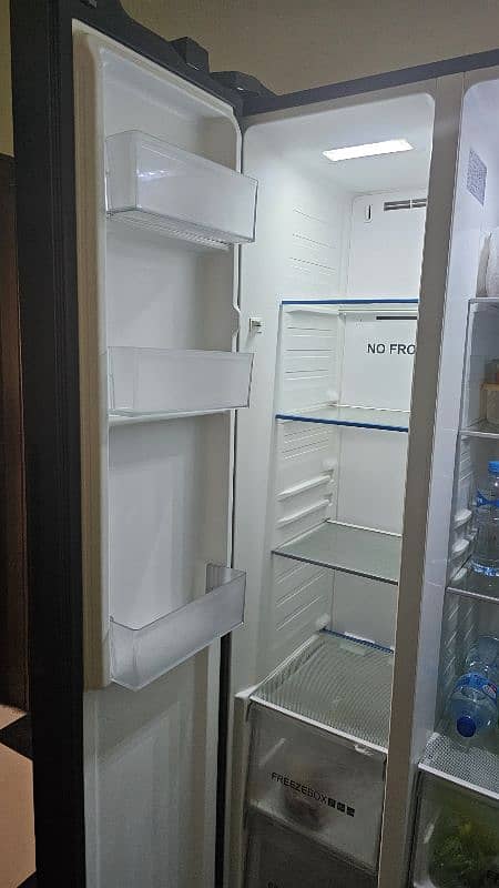 Luxury 20 Cu. Ft. Side-by-Side Refrigerator with Inverter & Ice Maker" 8