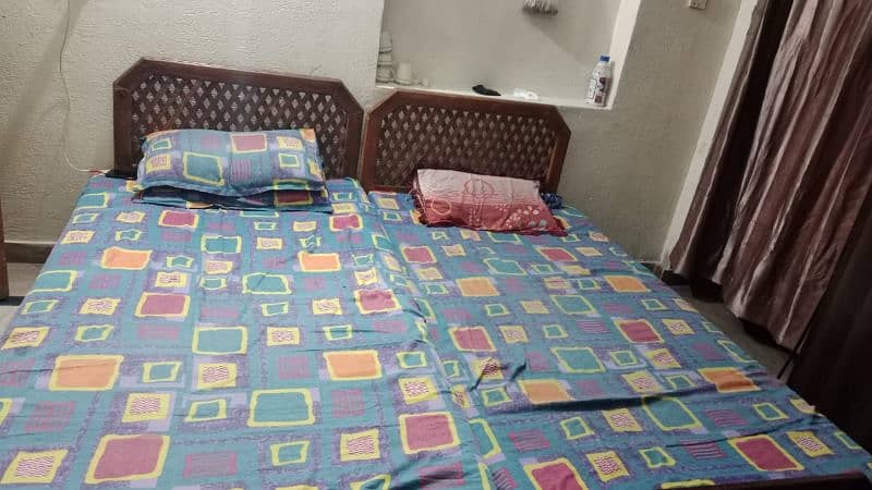 Assalam Alaikum  2 single beds for sale 4