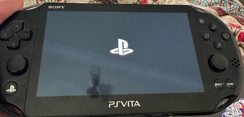 ps vita slim (10/10 condition ) 0