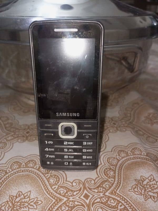 Samsung Phone 5mega Pix Oregnal phoneyy 7