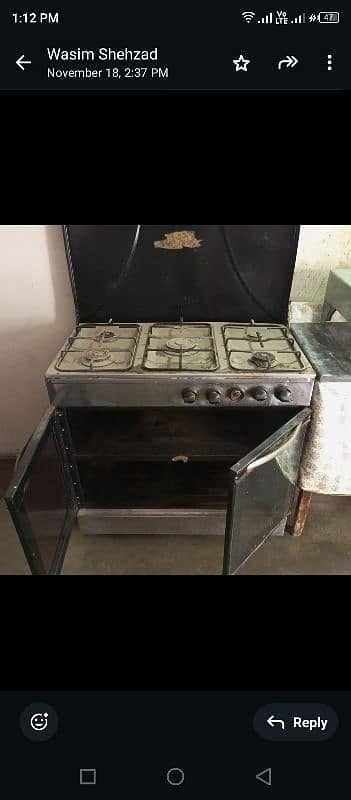 Stove with storing space in good condition 1