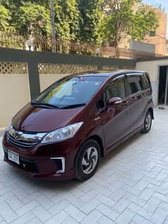 HONDA FREED+HYBRID G HONDA SENSING  DUAL AUTO DOOR  7 SEATER