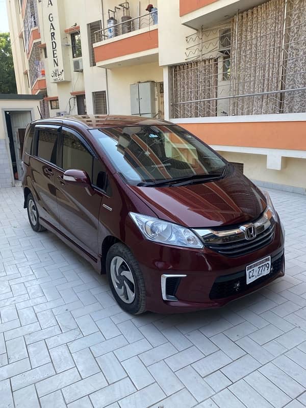 HONDA FREED+HYBRID G HONDA SENSING  DUAL AUTO DOOR  7 SEATER 1