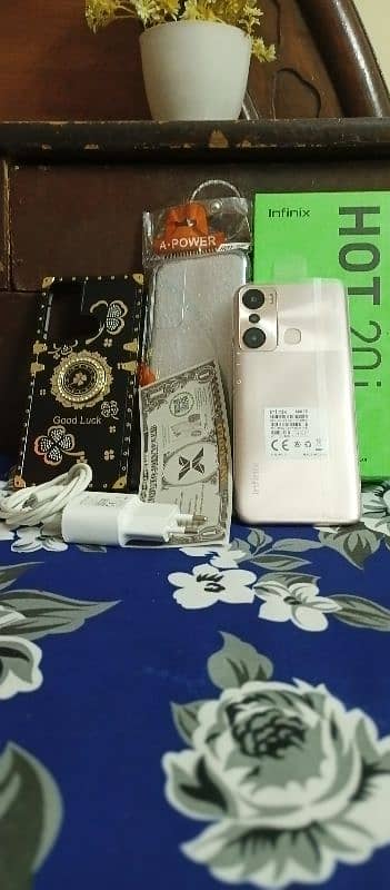 infinix hot 20i 4+3=7/64gb ram. with box . no open no repair. 4