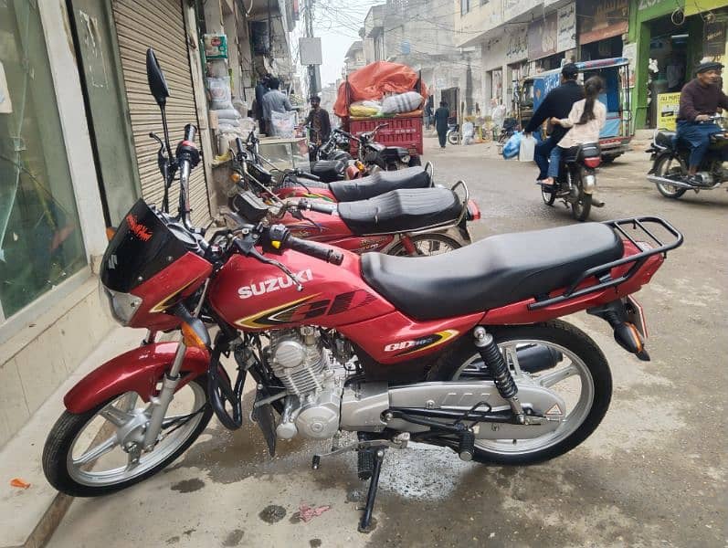 Motorcycle Suzuki GD 110 red colour motorbike condition 10/9 2