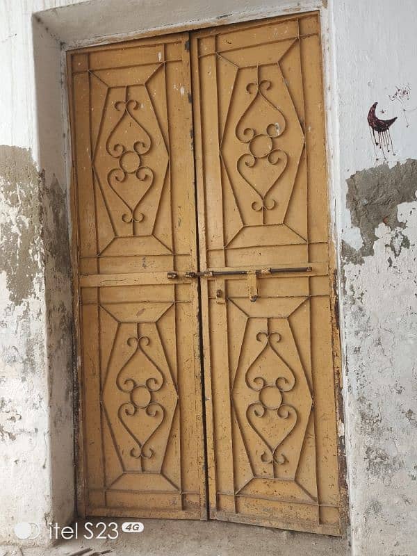 Two iron doors with three iron windows (with grill),Two wooden almari. 3