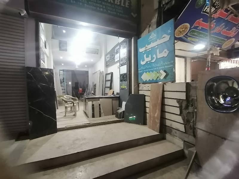 SHOP For rent 320 feet main road facing 1250 hight 24 feet with attached bath Behind zahid sweets 0