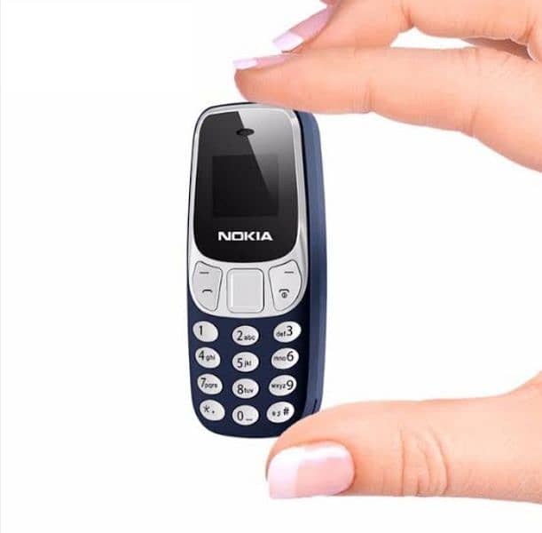 Nokia 3310 mini mobile phone in new condition. Finger size mobile . 1