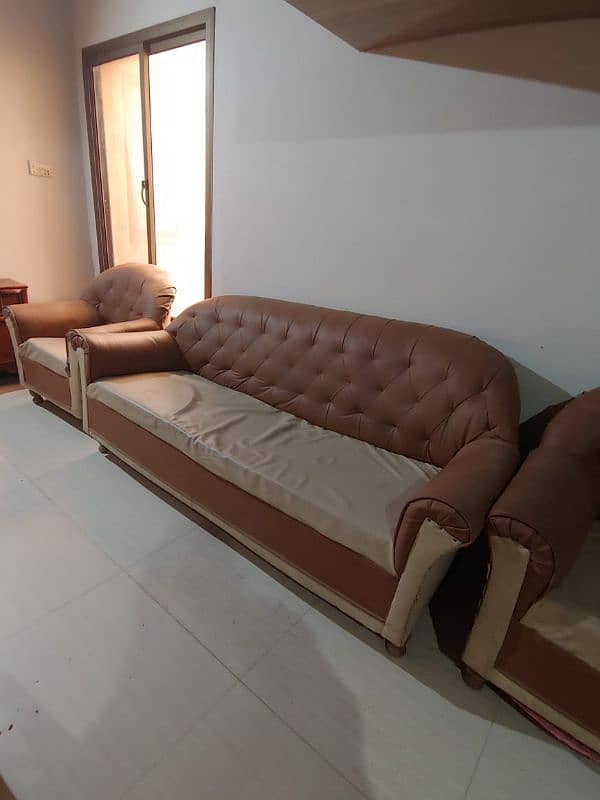 brown and skin sofa set 0