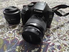 Canon 1300D (full box + 50 mm lens + Toyani tripod/Monopod)