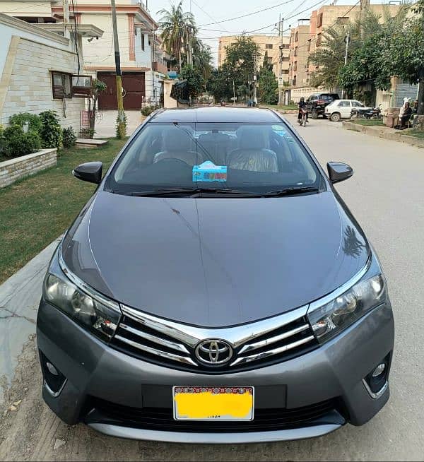 Toyota Corolla GLI 2016 registered original gun metallic color 2