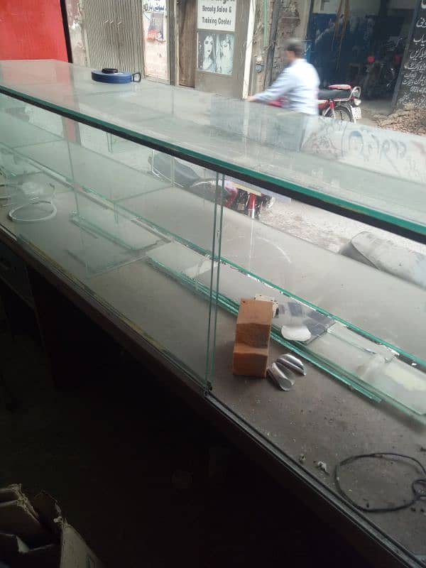 iron racks and glass counter 0