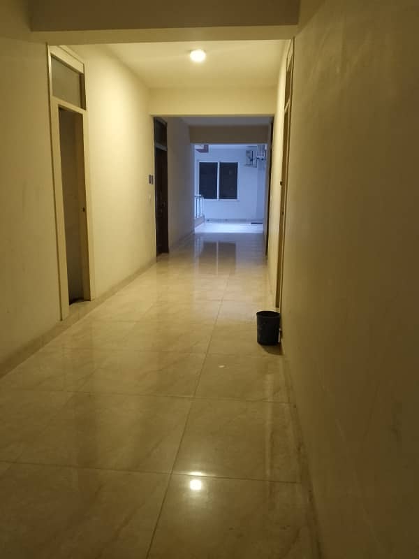 Beautiful apartment for rent in f11 exactive height beautiful tile floor 2 bedroom with attached bathroom TV lounge kitchen 0