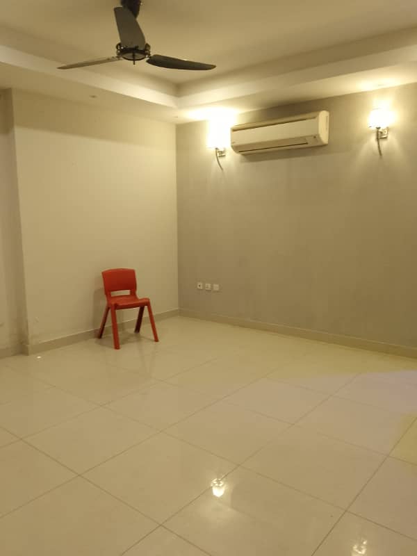 Beautiful apartment for rent in f11 exactive height beautiful tile floor 2 bedroom with attached bathroom TV lounge kitchen 1