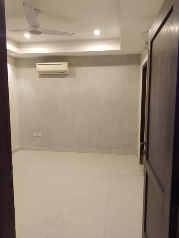 Beautiful apartment for rent in f11 exactive height beautiful tile floor 2 bedroom with attached bathroom TV lounge kitchen 4