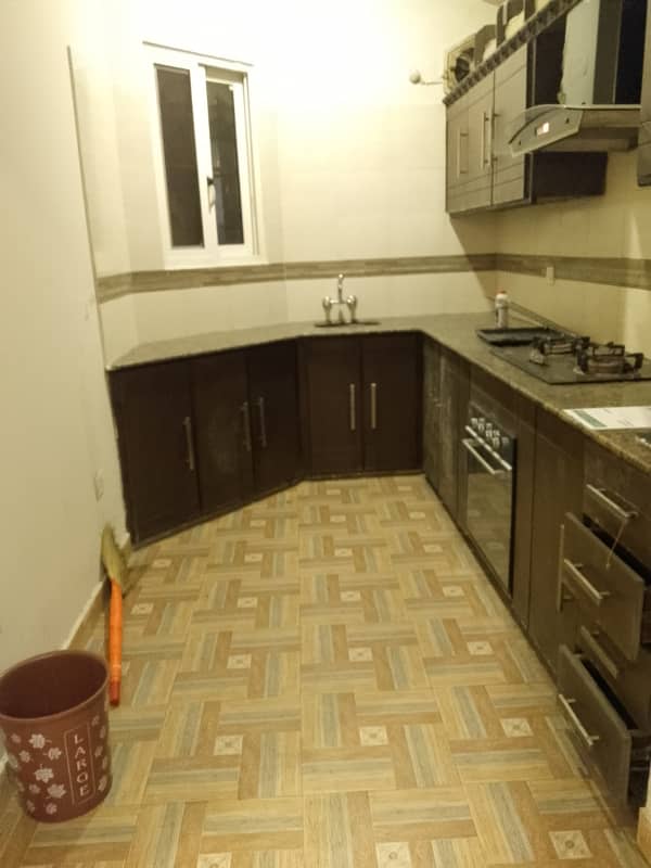 Beautiful apartment for rent in f11 exactive height beautiful tile floor 2 bedroom with attached bathroom TV lounge kitchen 7