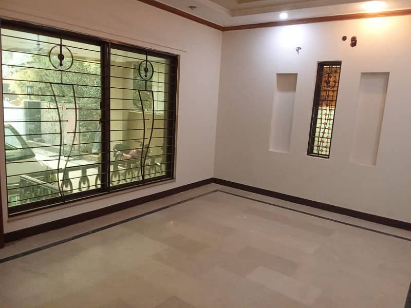 Facing Park Independent 1 Kanal Lower Portion With Separate Gate Available For Rent in GG Block DHA Phase 4 0