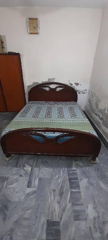 Queen size bed along with mattress. 2