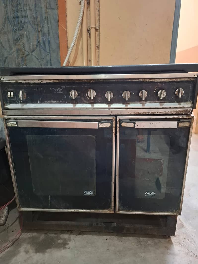 Used cooking range with 5 burners with oven and grill hotpoint 0