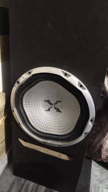 Sony xplod woofer and solid audio amp 1