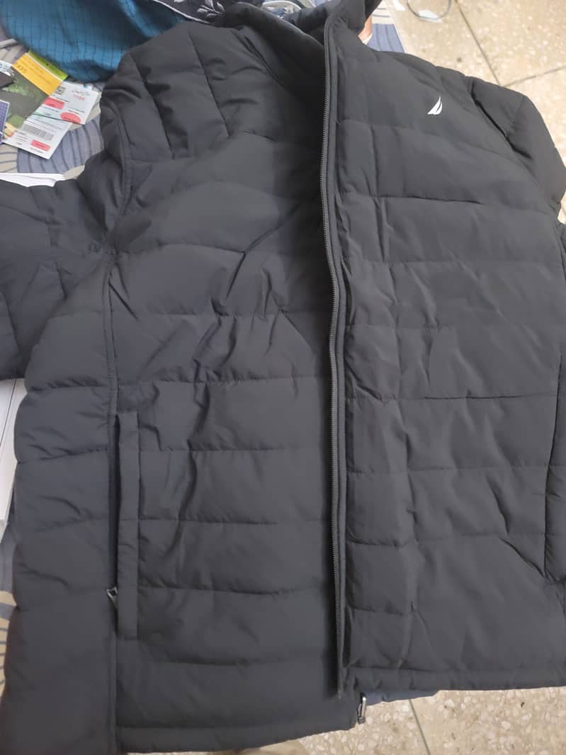 Never worn imported puffer jacket nautica. 1