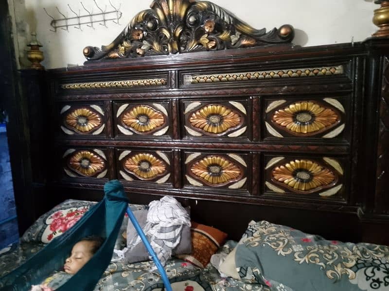 king size wooden bed with side tables and dressing table 1