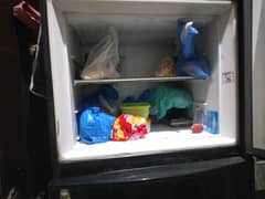 Used fridge for sale with every tray and accessories. .