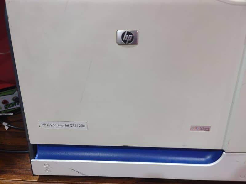 HP Laserjet color printer CP3525 with Table 4