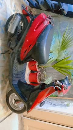 Red scooty in good condition and cheap price