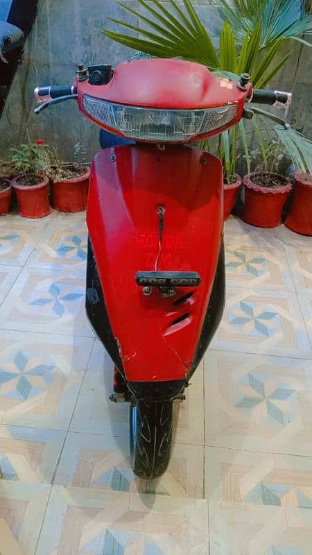 Red scooty in good condition and cheap price 1