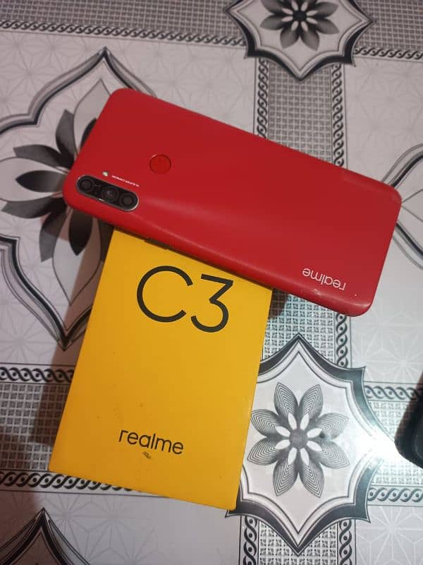 realme c3 3gb 32gb box sirf halka sa bal cerk haiour back dokan cheng 0