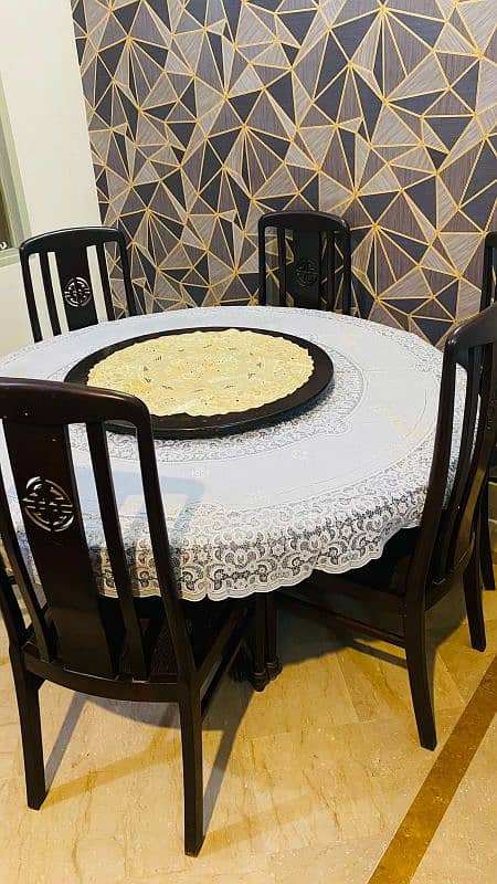 WOODEN DINNING TABLE WITH REVOLVING TOP ROUND 1