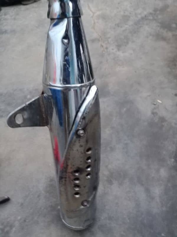 Suzuki 150 genuine silencer and tyre new tyre 6 month use price 8500 1