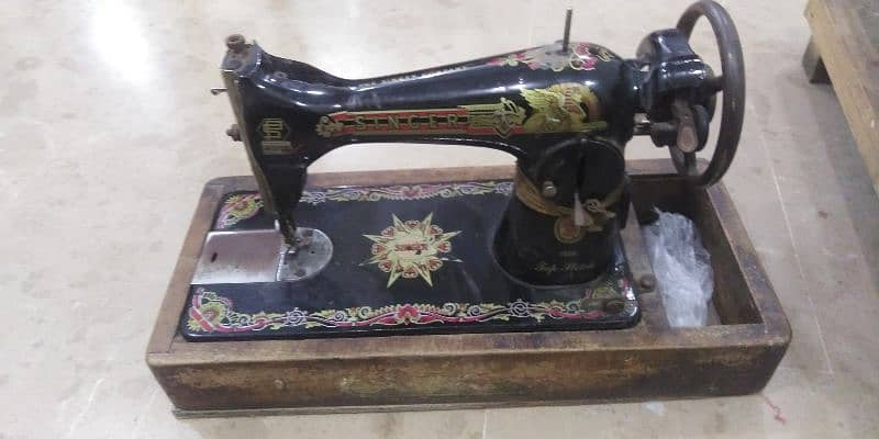 singer sewing mechine used. . 0