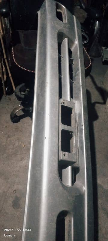 Mehran front bumper( silver color) 1