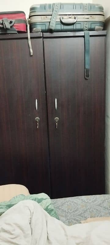 Two door and sliding door Cupboard 1