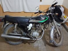 A Honda 125 2013 model for sale in Karachi Sialkot number