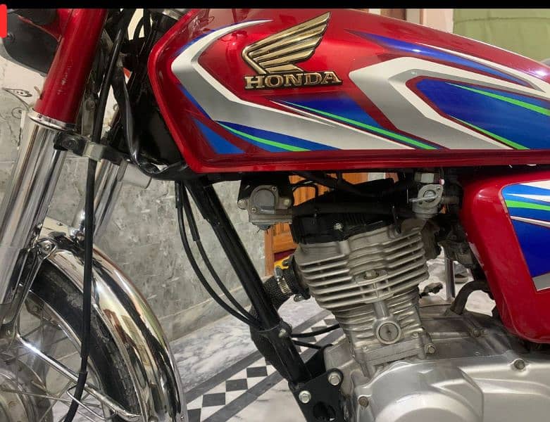 Honda 125. . 2022 modal. . Islamabad number. . 10/9.5 condition. . 1