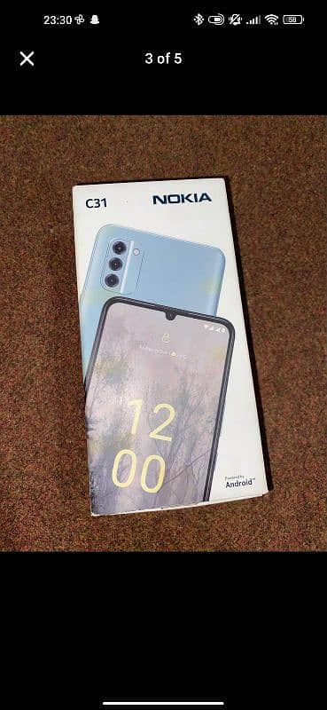 Nokia C31 with Box and Adapter 2