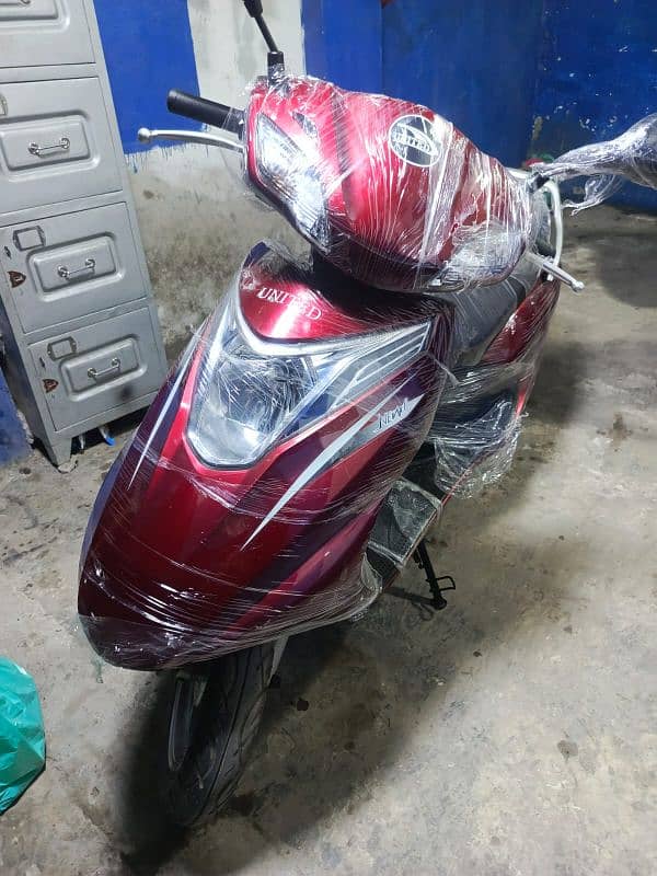 united 100cc full automatic scooty 7