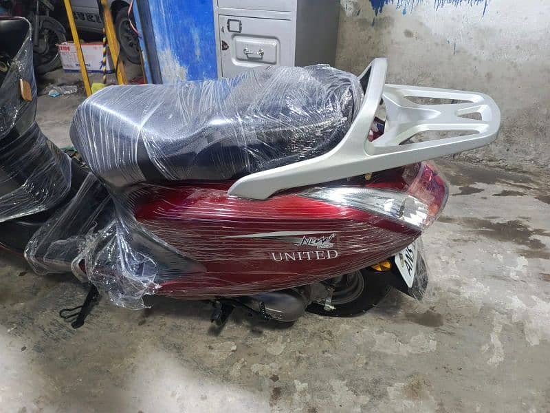 united 100cc full automatic scooty 8