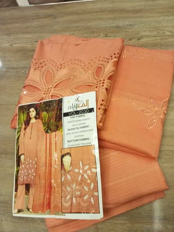 laser cut beautiful dhanak peach wool fabric ladies suit 0