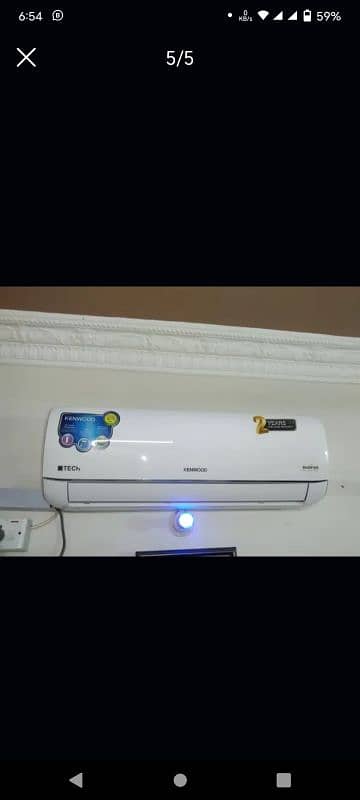 1 ton inverter AC sell heat and cool almost new guy 0