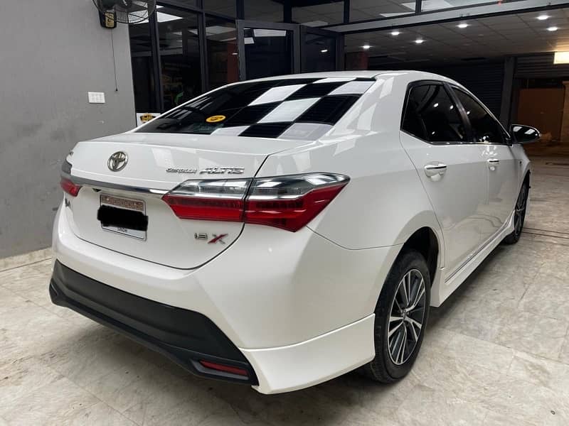 Toyota Corolla Altis grande X CVT-i 1.8 black interior 2023 4