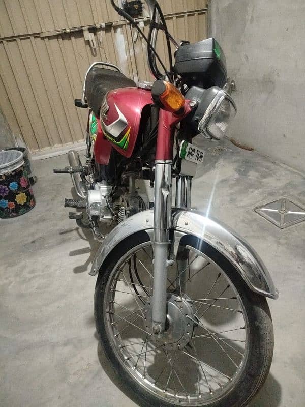 Honda cd 70 2022 ki bike ha lakin number 2021 ka ha 1