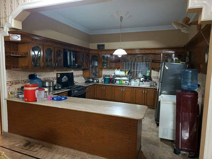 independent 400yd three bed dd bungalow for rent in johar 0