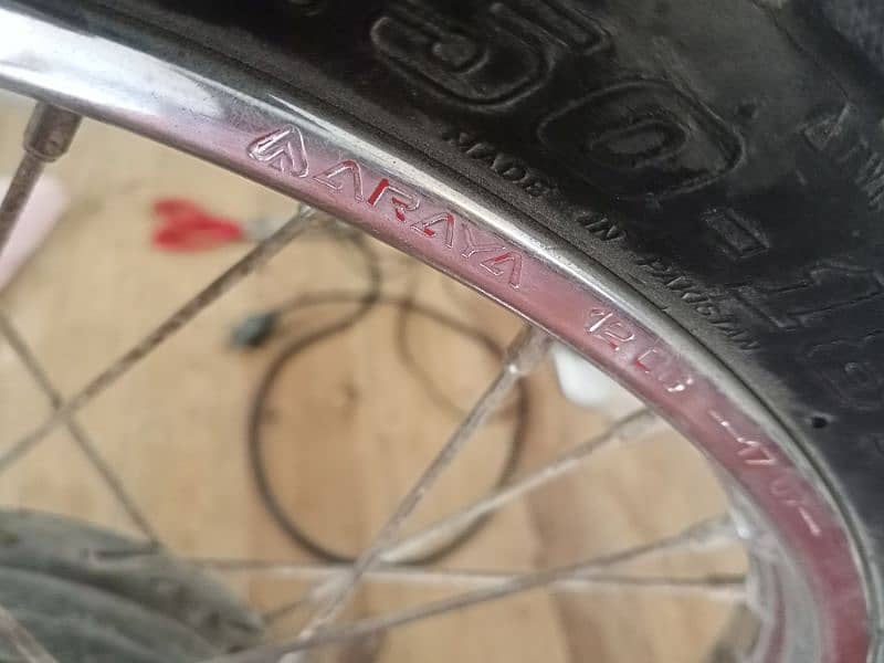 Honda 125 front Araya Rim with Tyre tube 0