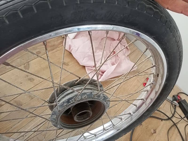 Honda 125 front Araya Rim with Tyre tube 1